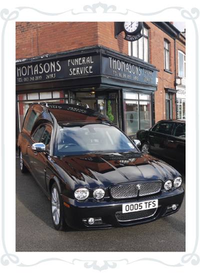 Hearse outside Thomasons Funerals